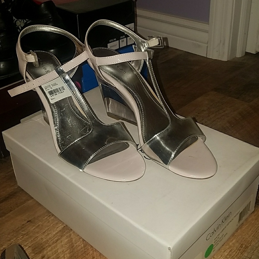 Wedged see thru heels.